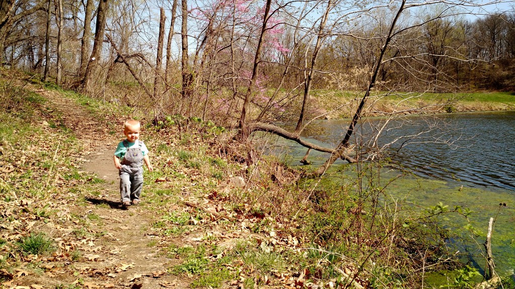Calvin walking by the lake.
